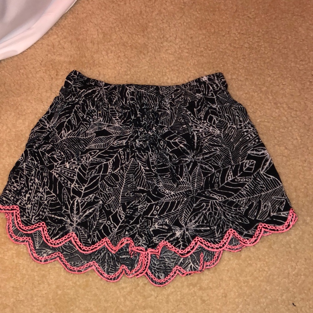 Black, white, and pink shorts.